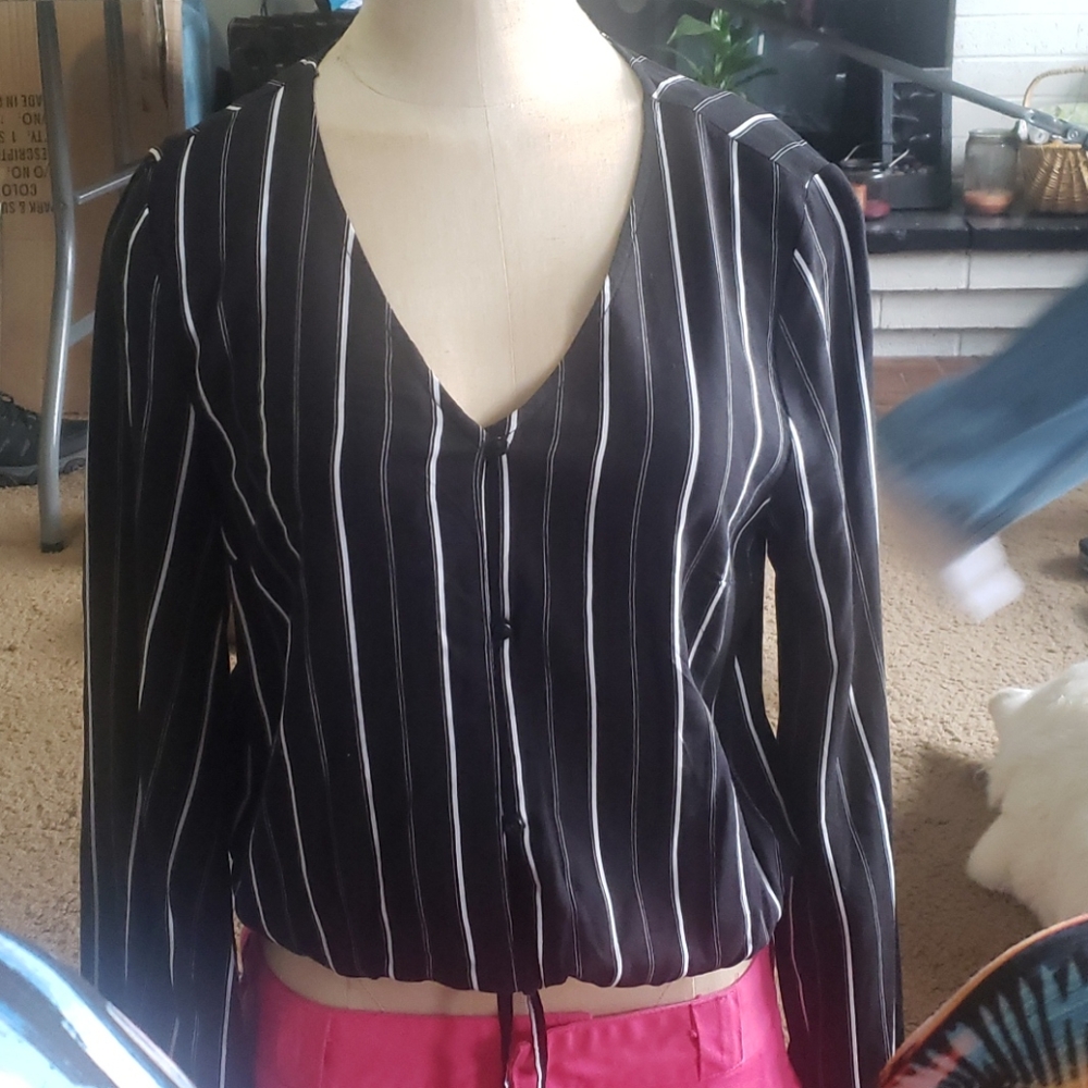 Dressy/casual blouse with drawstring waist.